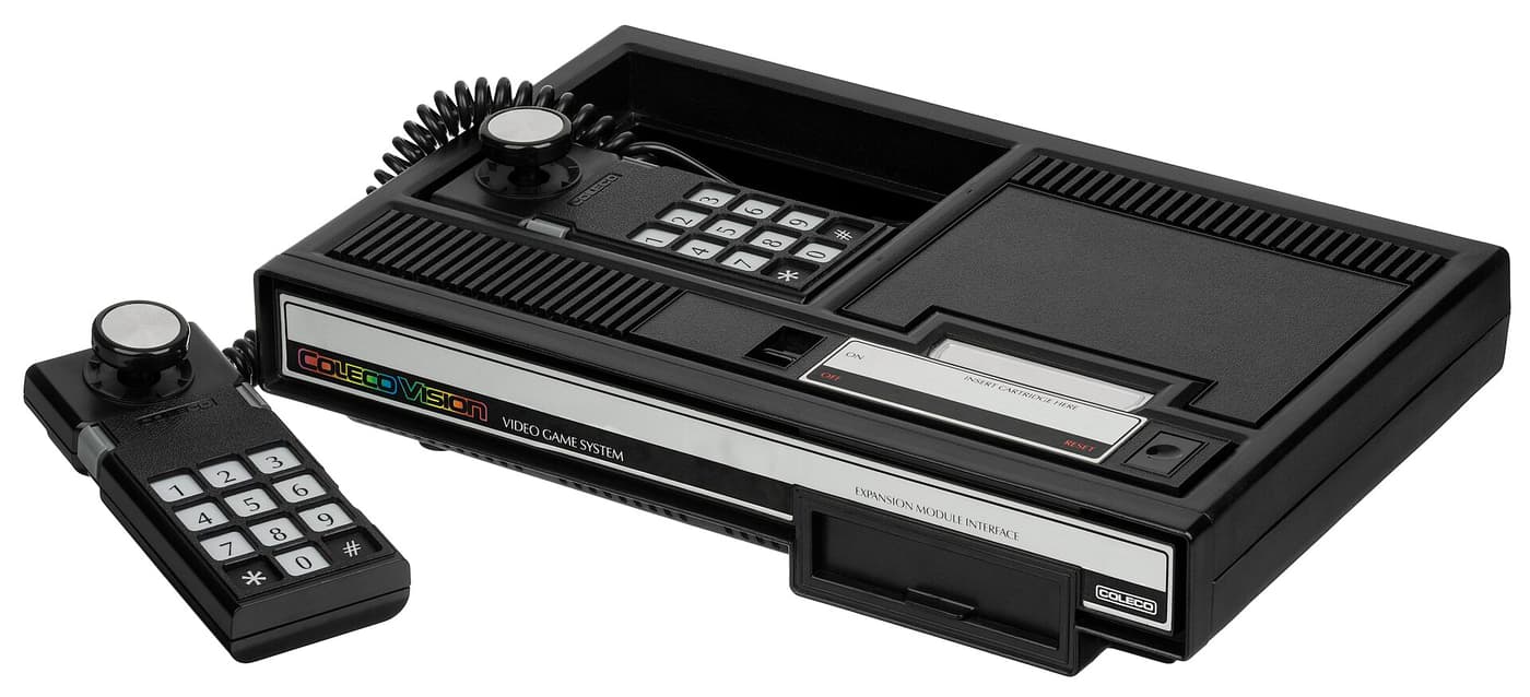 A black ColecoVision console with a keypad controller beside it